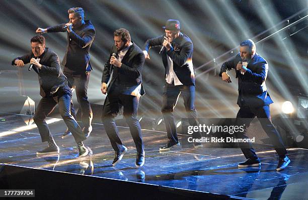 Chris Kirkpatrick, Joey Fatone, Justin Timberlake, JC Chasez and Lance Bass of 'N Sync perform during the 2013 MTV Video Music Awards at the Barclays...