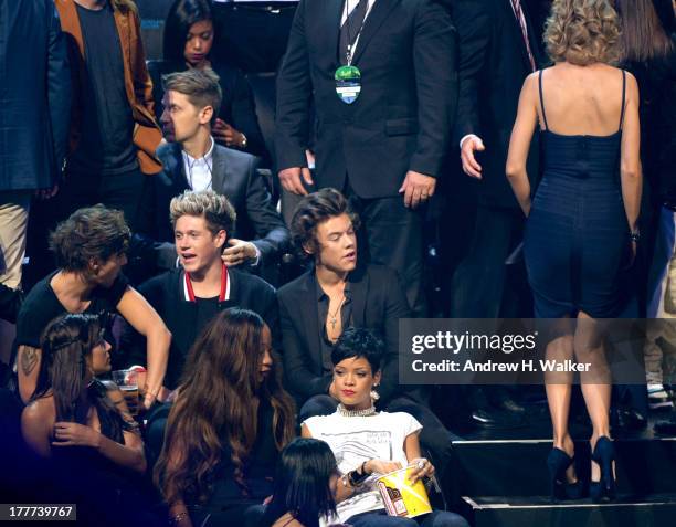 Louis Tomlinson, Niall Horan, Harry Styles and Taylor Swift attend the 2013 MTV Video Music Awards at the Barclays Center on August 25, 2013 in the...
