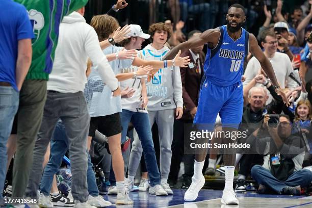 Tim Hardaway Jr. #10 of the Dallas Mavericks celebrates after making a three-point basket during the second half against the Charlotte Hornets at...