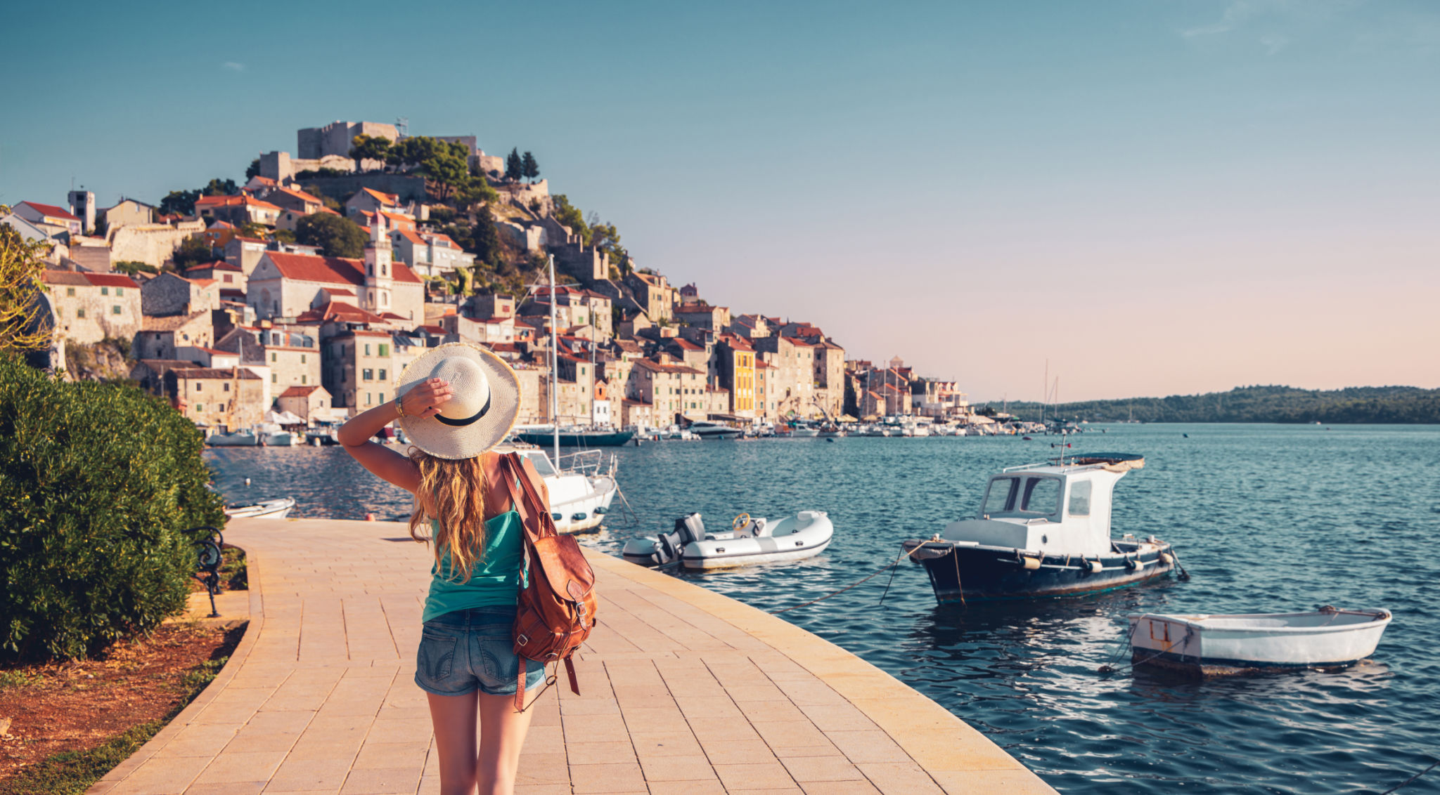 Woman tourist traveling in Europe- Croatia, Rovinj city, Adriatic sea- Istria Woman tourist traveling in Europe- Croatia, Rovinj city, Adriatic sea- Istria