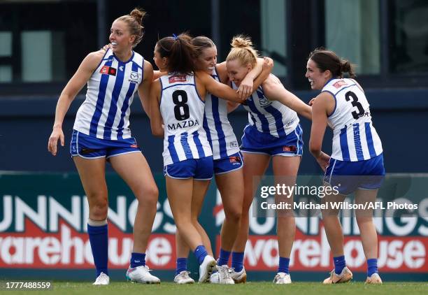 Kate Shierlaw of the Kangaroos celebrates with teammates during the 2023 AFLW Second Qualifying Final match between The Melbourne Demons and The...