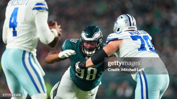 Jalen Carter of the Philadelphia Eagles rushes the passer against Zack Martin of the Dallas Cowboys at Lincoln Financial Field on November 5, 2023 in...