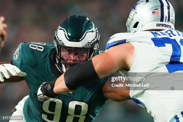 Jalen Carter of the Philadelphia Eagles rushes the passer against Zack Martin of the Dallas Cowboys at Lincoln Financial Field on November 5, 2023 in...