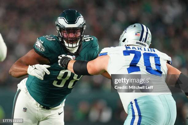 Jalen Carter of the Philadelphia Eagles rushes the passer against Zack Martin of the Dallas Cowboys at Lincoln Financial Field on November 5, 2023 in...