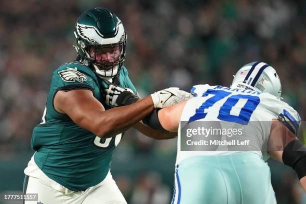 Jalen Carter of the Philadelphia Eagles rushes the passer against Zack Martin of the Dallas Cowboys at Lincoln Financial Field on November 5, 2023 in...