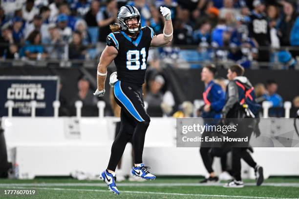 Hayden Hurst of the Carolina Panthers celebrates a catch against the Indianapolis Colts in the fourth quarter at Bank of America Stadium on November...