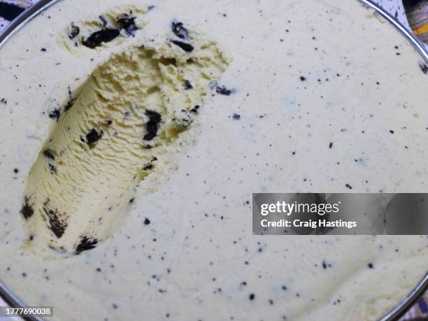 macro close up shot of ice cream sorbet - cookies and cream flavour - whip cream dollop stock pictures, royalty-free photos & images