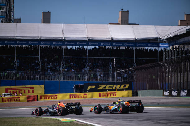 F1 Grand Prix of BrazilSAO PAULO, BRAZIL - NOVEMBER 05: Max Verstappen of the Netherlands driving the Oracle Red Bull Racing RB19 and Lando Norris of Great Britain driving the McLaren F1 Team MCL60 on track during the F1 Grand Prix of Brazil at Autodromo Jose Carlos Pace on November 05, 2023 in Sao Paulo, Brazil.
