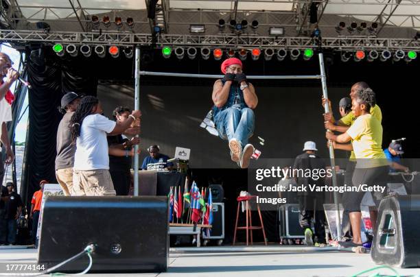 American DJ Kool Herc works out with the Bartendaz at the '40th Anniversary of Hip-Hop Culture' concert at Central Park SummerStage, New York, New...