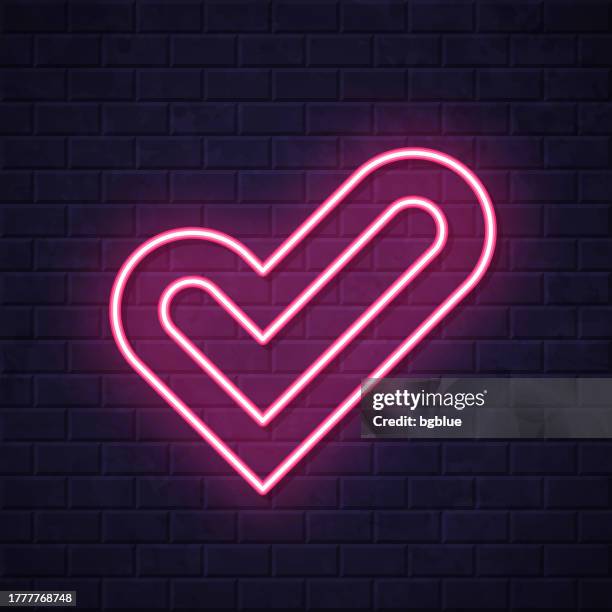 check mark. glowing neon icon on brick wall background - looking over wall stock illustrations
