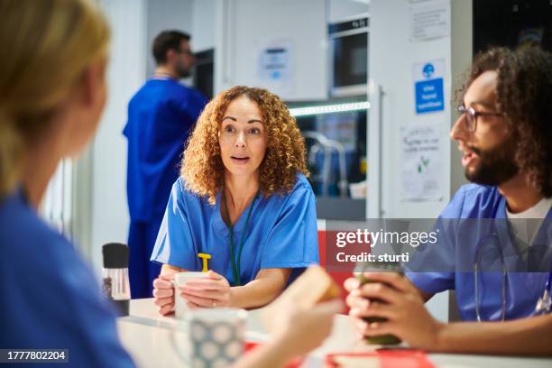 nurses taking a break - nhs stock pictures, royalty-free photos & images