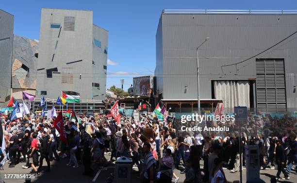 Around 100 thousand people, holding banners and Palestinian flags, gather in front of State Library Victoria to stage a pro-Palestinian demonstration...