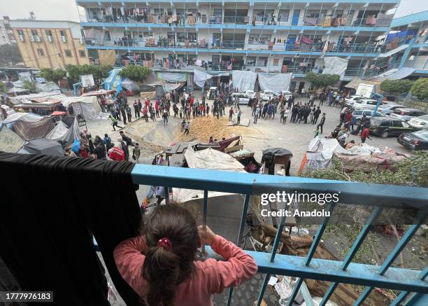 View of pit formed on the backyard of United Nations Relief and Works Agency for Palestine Refugees school used as a sheltering place for displaced...