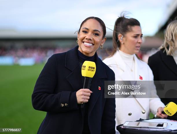 Alex Scott, former Arsenal player poses for a photo whilst working pitchside for BBC Sport at half-time during the Barclays Women´s Super League...