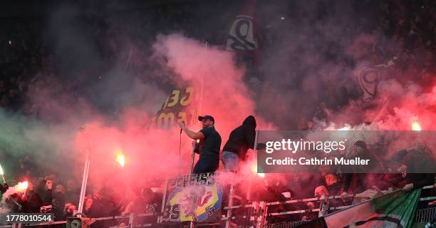 Supporters of Hannover 96 burning flares during the Second Bundesliga match between Hannover 96 and Eintracht Braunschweig at Heinz von Heiden Arena...