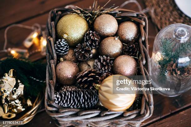 christmas christmas card with fir branches, golden christmas bal - flower garland stock pictures, royalty-free photos & images