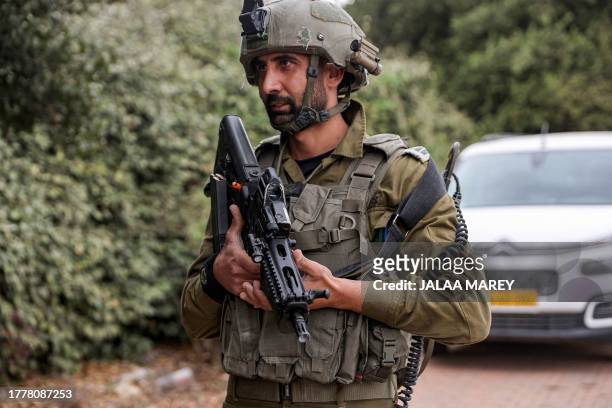 Israeli army officer Kamal Saad, a member of the Druze minority, looks on while on patrol with his unit in an unidentified town in northern Israel...