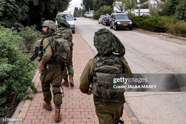 Israeli army officer Kamal Saad , a member of the Druze minority, looks on while on patrol with his unit in an unidentified town in northern Israel...