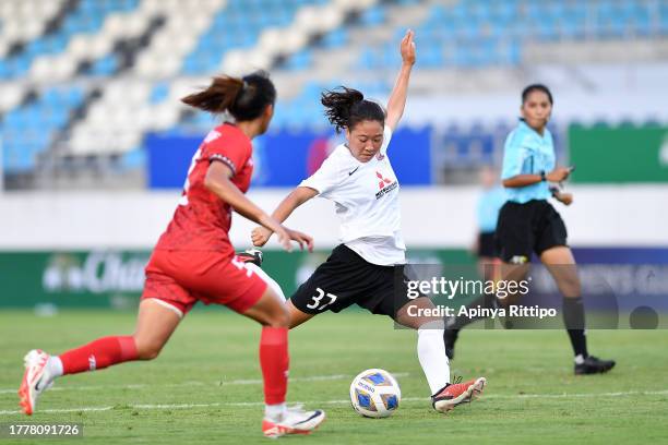 Ena Takatsuka of Mitsubishi Heavy Industries Urawa Reds Ladies shoots the ball during the AFC Women's Club Championship Group A match between...