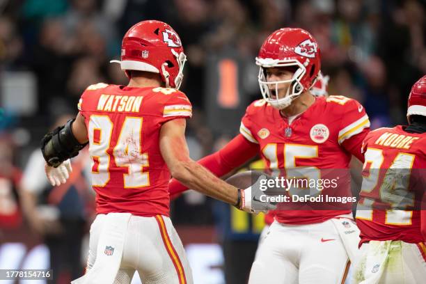 Justin Watson of Kansas City Chiefs and Patrick Mahomes of Kansas City Chiefs celebrate during the NFL match between Miami Dolphins and Kansas City...