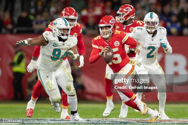 Patrick Mahomes of Kansas City Chiefs controls the ball during the NFL match between Miami Dolphins and Kansas City Chiefs at Deutsche Bank Park on...