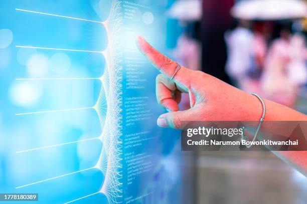 hand touching hologram on artificial intelligence and program coding concepts - engagement des clients photos et images de collection