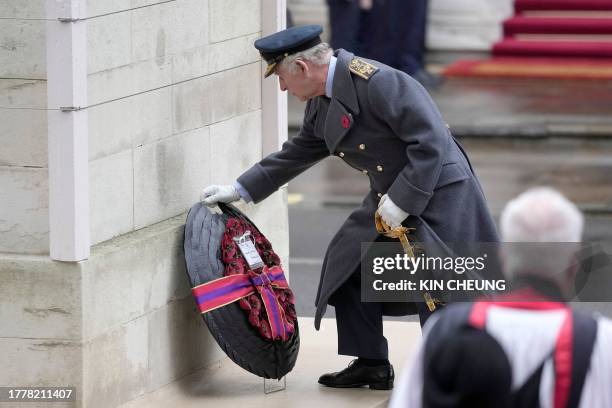 Britain's King Charles III lays a wreath as he attends the National Service of Remembrance at the Cenotaph on Whitehall in central London, on...