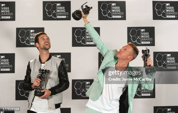 Ryan Lewis and Macklemore pose in the press room with the Best Hip Hop Video and Best Cinematography awards the 2013 MTV Video Music Awards at the...