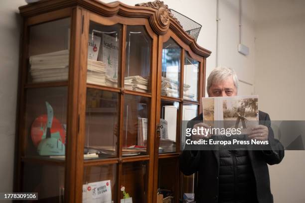 Writer and journalist Sorj Chalandon poses with his new book 'Son of a Bastard', at La Central del Raval, Nov. 6 in Barcelona, Catalonia, Spain. The...