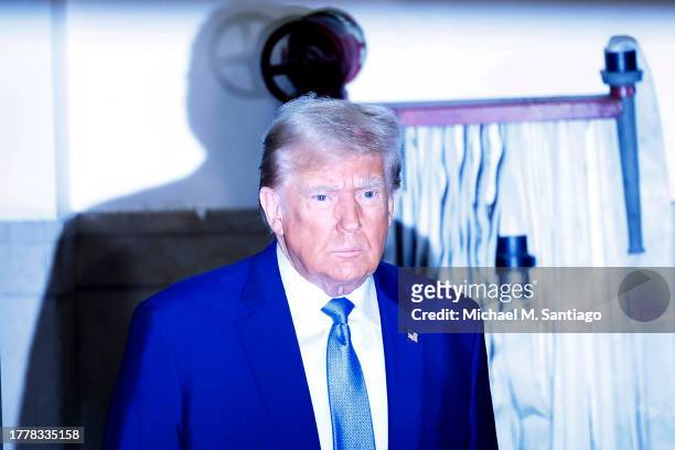 Former President Donald Trump arrives for his civil fraud trial at New York State Supreme Court on November 06, 2023 in New York City. Trump is...