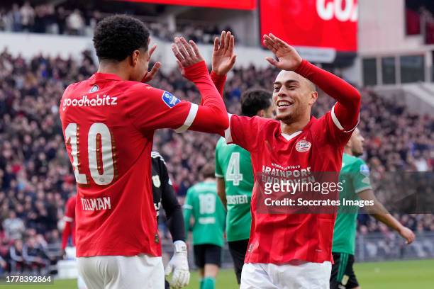 Malik Tillman of PSV celebrates 4-0 with Sergino Dest of PSV during the Dutch Eredivisie match between PSV v PEC Zwolle at the Philips Stadium on...