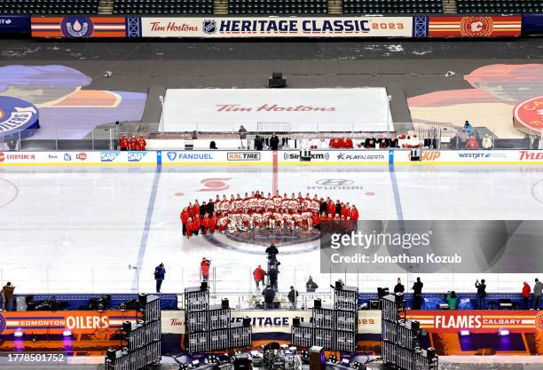 The Calgary Flames pose for a team photo before practice at Commonwealth Stadium on October 28, 2023 in Edmonton, Alberta.