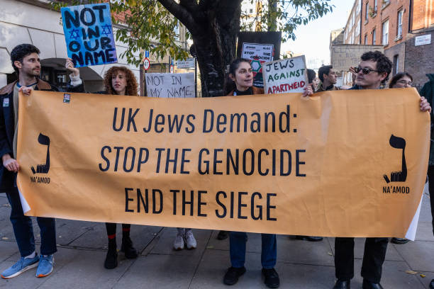 Members of the Jewish community take part in an Armistice Day march from Hyde Park to the US embassy with hundreds of thousands of pro-Palestinian...