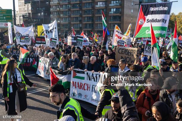 Hundreds of thousands of pro-Palestinian protesters take part in an Armistice Day march from Hyde Park to the US embassy to call for an immediate...