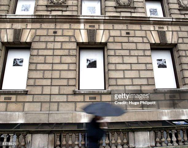 Person walks past the Foreign Office, which recently had its windows made bombproof following security threats February 12, 2003 in London. The...