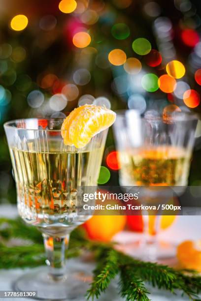 close-up of drink on table - tangerine martini stock pictures, royalty-free photos & images