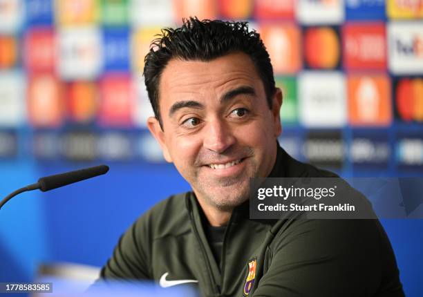 Xavi Hernández, head coach of FC Barcelona talks with the media during a press conference at Volksparkstadion on November 06, 2023 in Hamburg,...