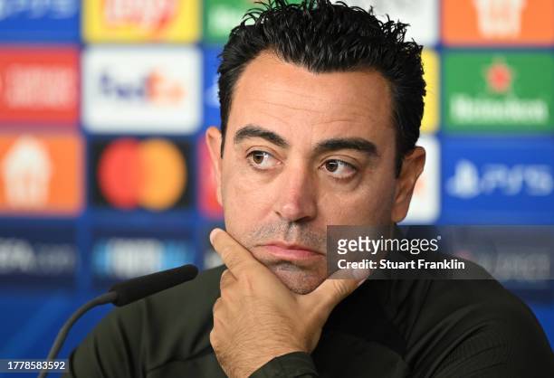 Xavi Hernández, head coach of FC Barcelona talks with the media during a press conference at Volksparkstadion on November 06, 2023 in Hamburg,...