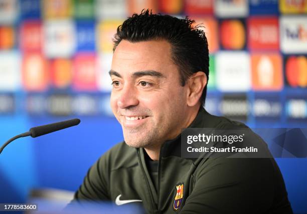 Xavi Hernández, head coach of FC Barcelona talks with the media during a press conference at Volksparkstadion on November 06, 2023 in Hamburg,...
