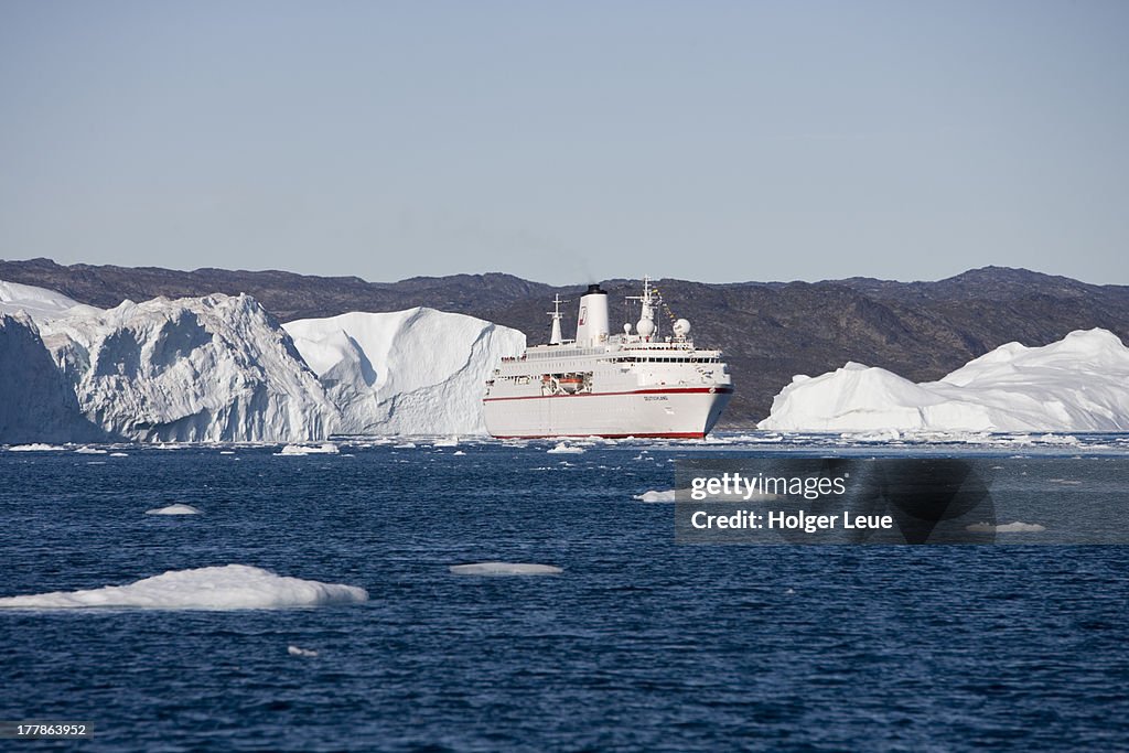 Cruise ship and icebergs