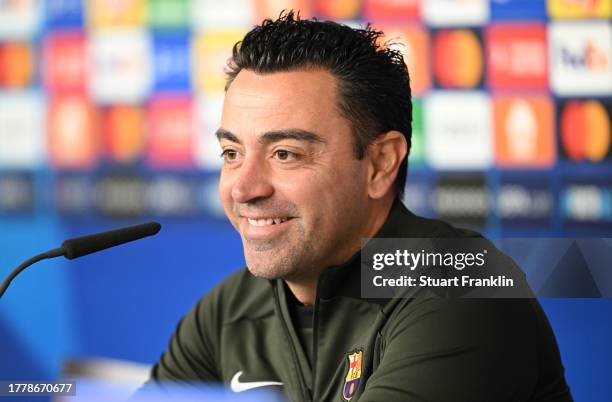 Xavi Hernández, head coach of FC Barcelona talks with the media during a press conference at Volksparkstadion on November 06, 2023 in Hamburg,...