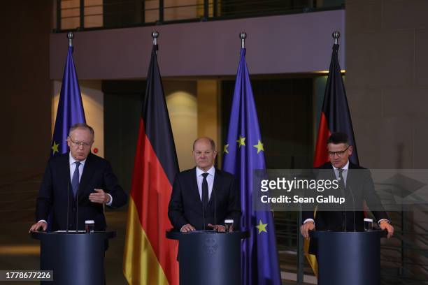 Lower Saxony Premier Stephan Weil, German Chancellor Olaf Scholz and Hesse Premier Boris Rhein speak to the media to present their "Germany Pact"...