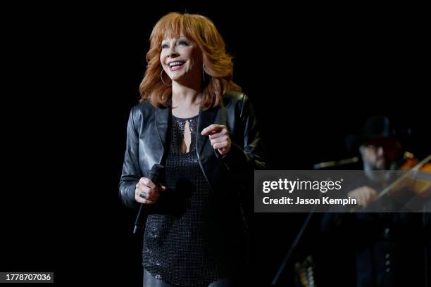 Reba McEntire performs onstage during Not That Fancy: An Evening With Reba & Friends at Ryman Auditorium on November 05, 2023 in Nashville, Tennessee.