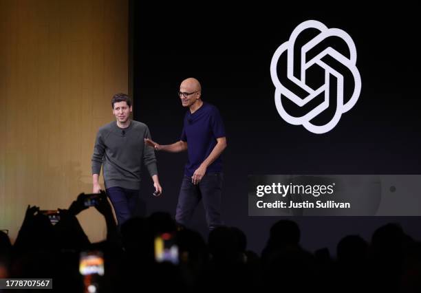 Microsoft CEO Satya Nadella greets OpenAI CEO Sam Altman during the OpenAI DevDay event on November 06, 2023 in San Francisco, California. Altman...