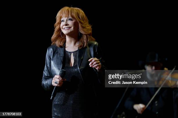 Reba McEntire performs onstage during Not That Fancy: An Evening With Reba & Friends at Ryman Auditorium on November 05, 2023 in Nashville, Tennessee.