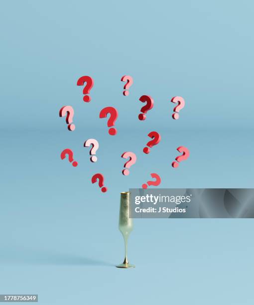 champagne glass with question marks - jmarks stock pictures, royalty-free photos & images