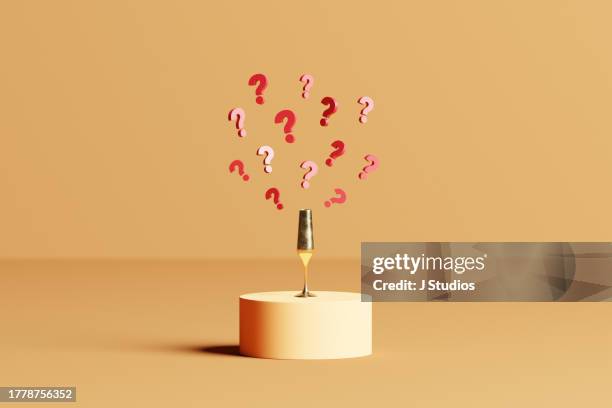 champagne glass with question marks - jmarks stock pictures, royalty-free photos & images