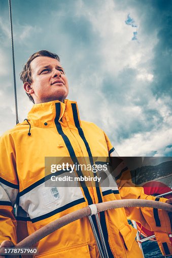 Skipper sailing on sailboat