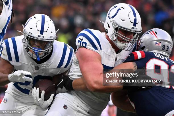 Indianapolis Colts' running back Jonathan Taylor runs with the ball during the NFL American football match Indianapolis Colts vs New England Patriots...