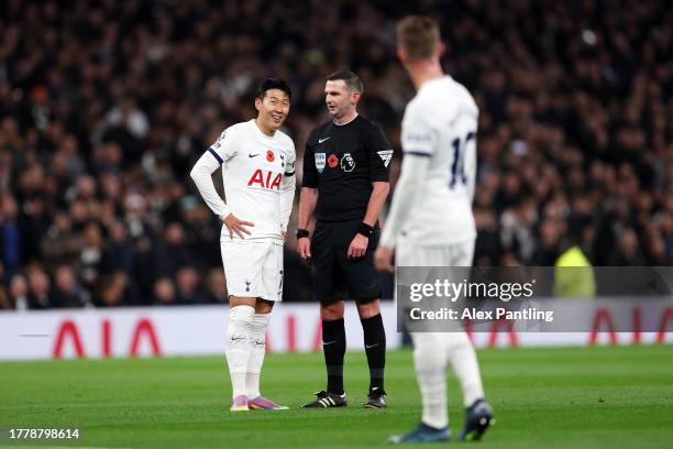 Son Heung-Min of Tottenham Hotspur speaks to Referee Michael Oliver after his goal is ruled out for offside during the Premier League match between...